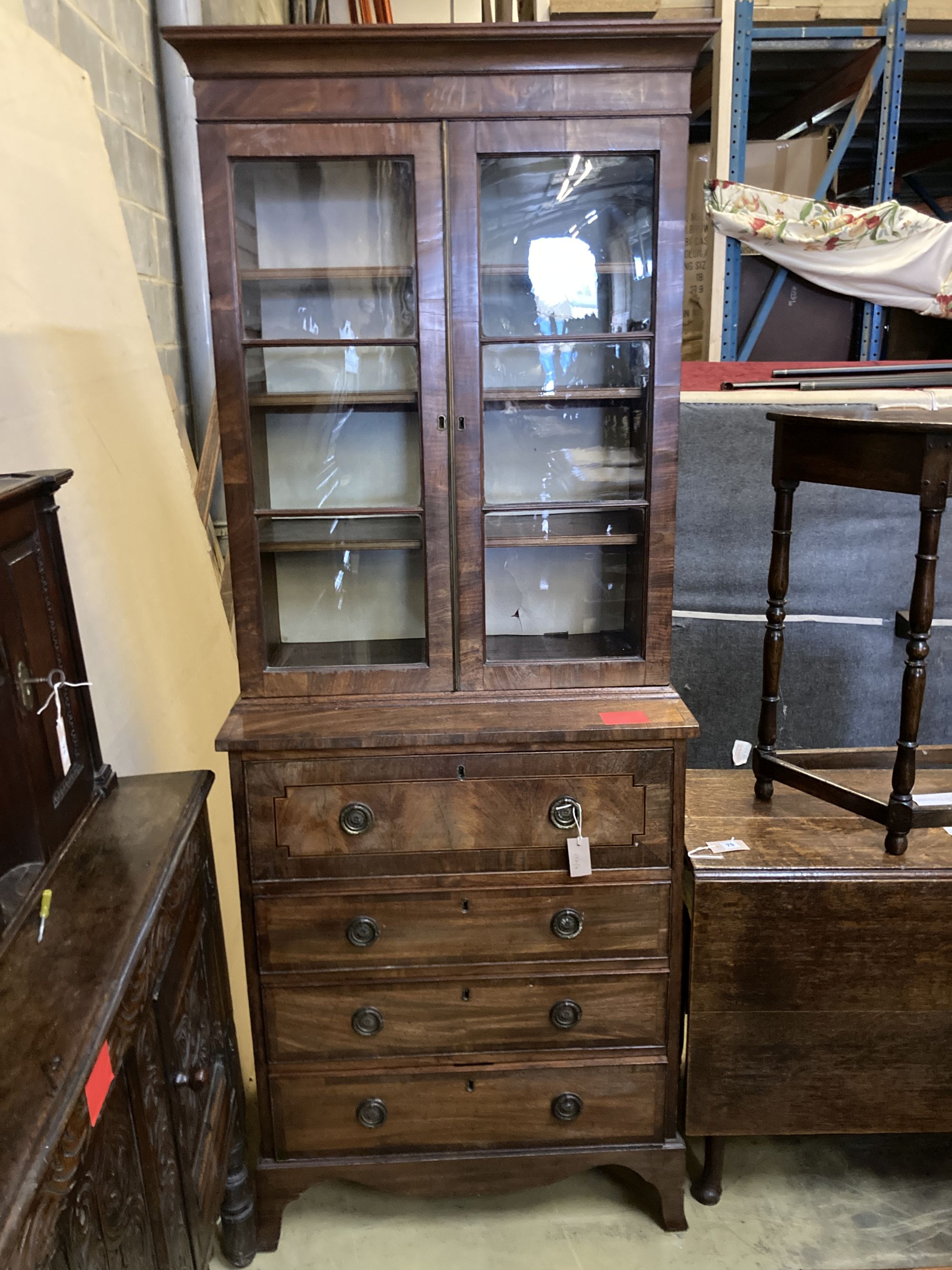 A George III Sheraton style secretaire bookcase, width 79cm, depth 49cm, height 210cm